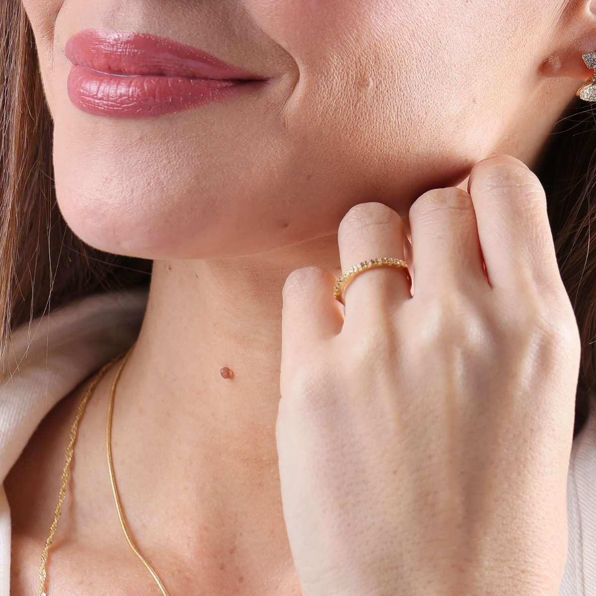ANEL BANHADO A OURO APARADOR COM NOVE ZIRCÔNIAS